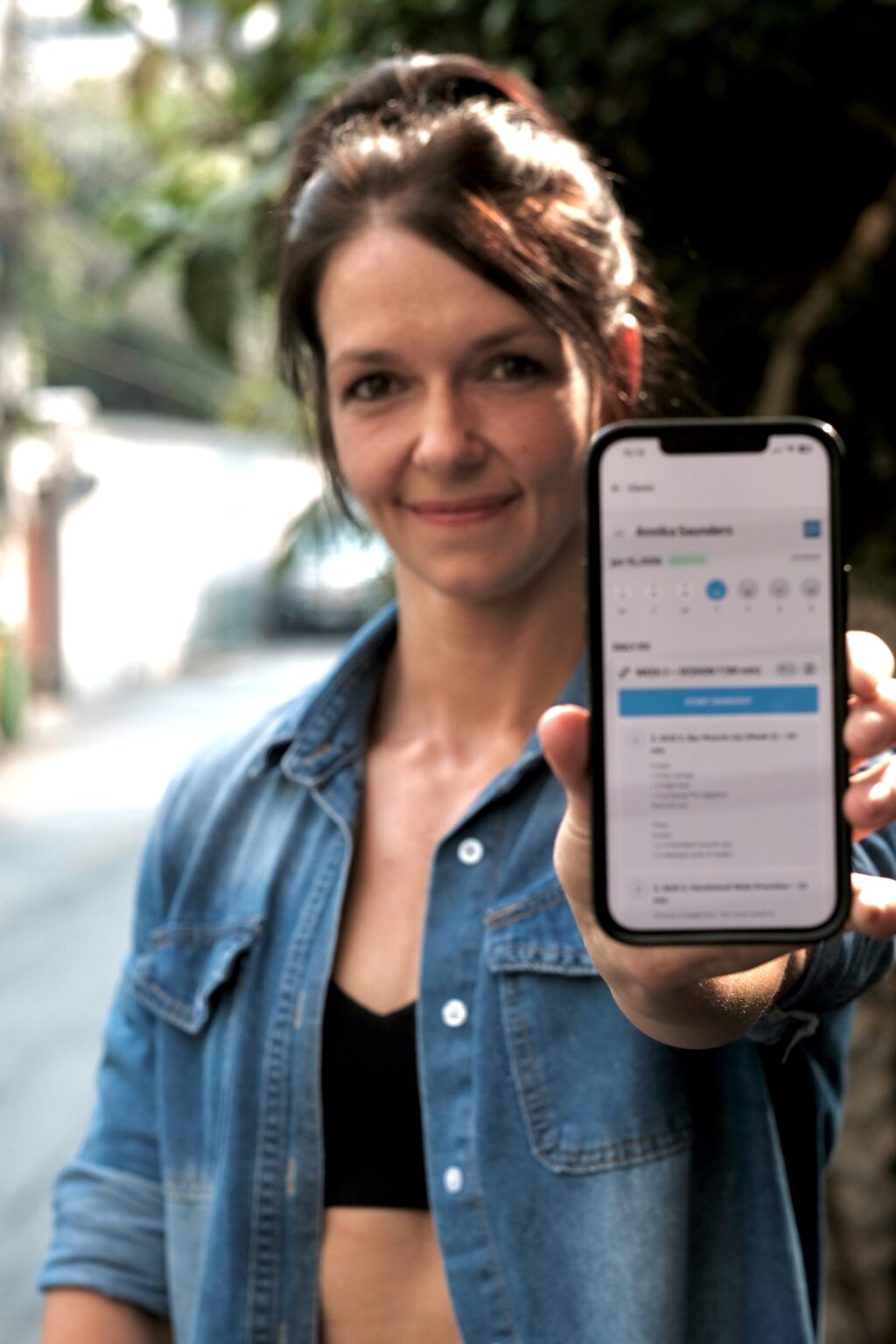 Coach Anna showing the coaching app